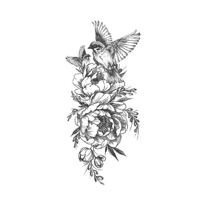 The Skybloom Tattoo by YUANHUA showcases a detailed black and white illustration featuring two birds in flight, perched on and soaring above a cluster of blooming peonies with intricate petals. The flowers are accompanied by leaves and smaller buds, all arranged in an aesthetically pleasing vertical composition—making it the perfect design for a temporary tattoo.